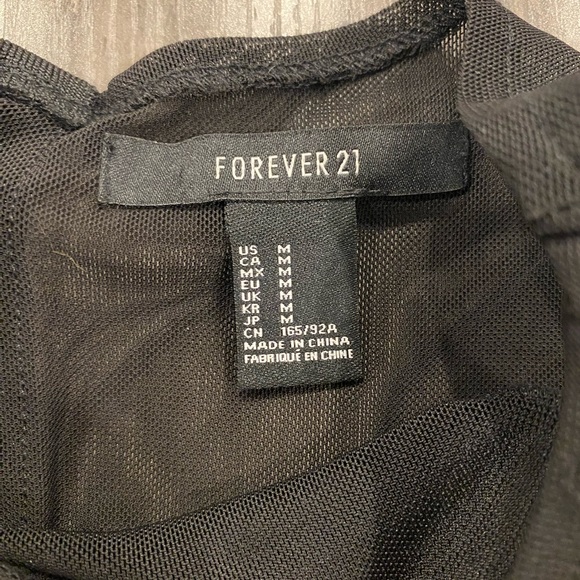 Bodycon dress with mesh neckline - Picture 3 of 3